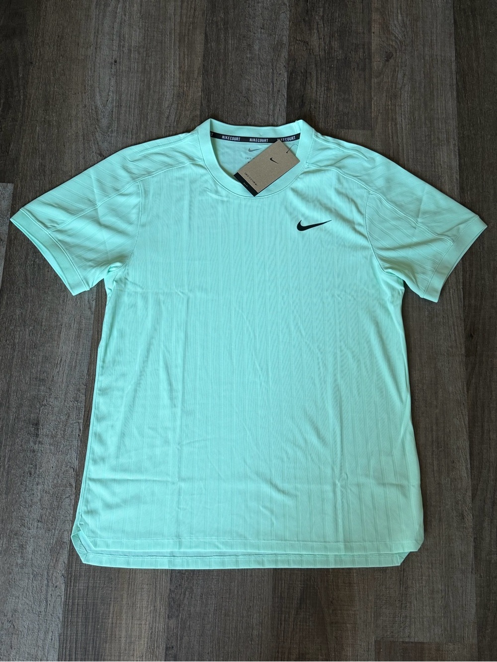 Nike Court Slam Dri-Fit ADV Tennis Shirt.
- Size M Men.
